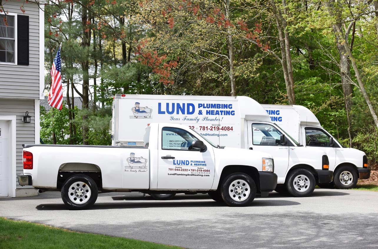 Lund Plumbing and Heating trucks