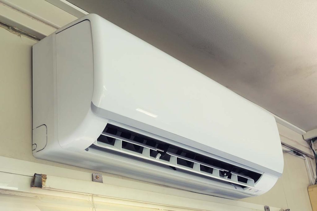 A wall-mounted air conditioning unit, exemplifying the sleek and efficient cooling installations Lund Plumbing and Heating offers in Lexington, Massachusetts.