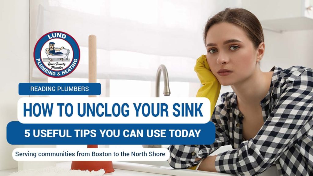 A woman with a plunger at her kitchen sink illustrating one of the ways you can unclog your sink