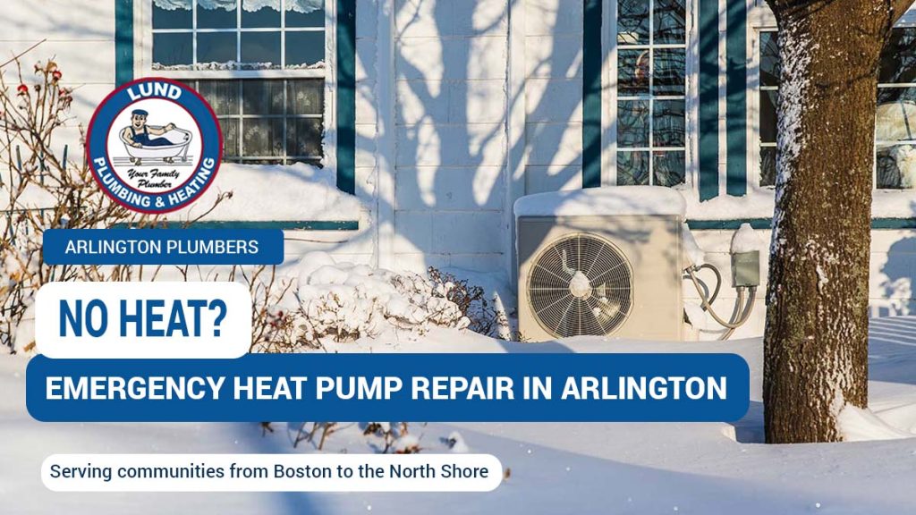 An outdoor heat pump covered in snow, emphasizing the need for emergency heat pump repair in Arlington during winter months.